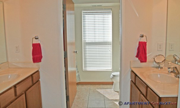 Double Sink Compartmentalized Bathroom