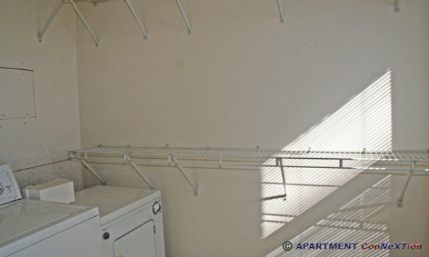 Walk-In Closet & Laundry (Bedroom 1)