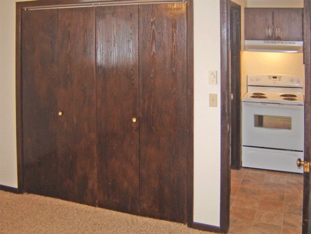 Bedroom, Closed Closet, Kitchen Ahead