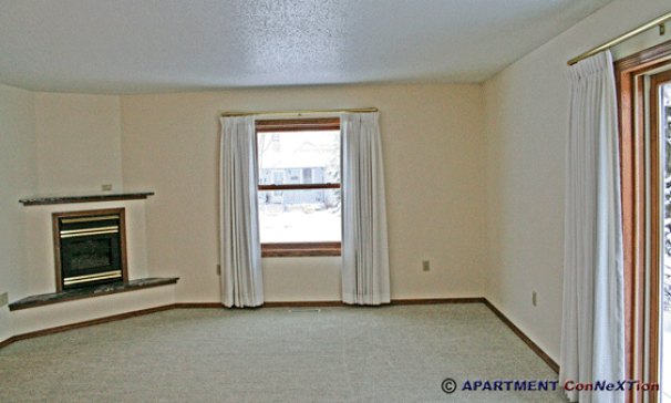 Living Room with Corner Fireplace