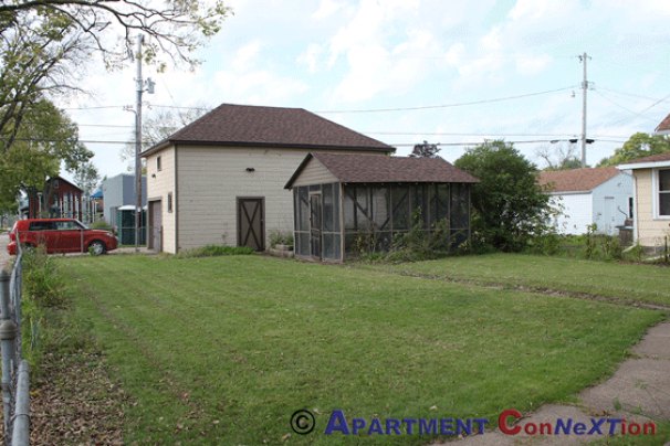Back Yard with Detached Garage & Screen House