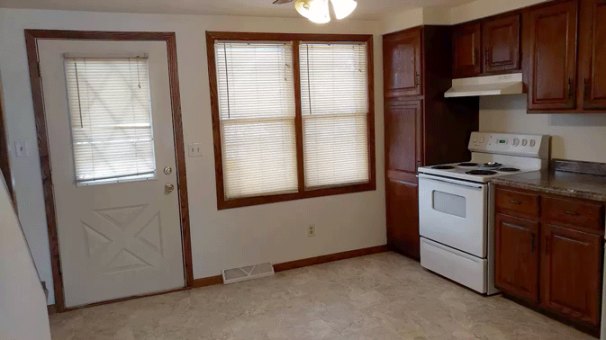 Kitchen Dinette Space & Door to Patio