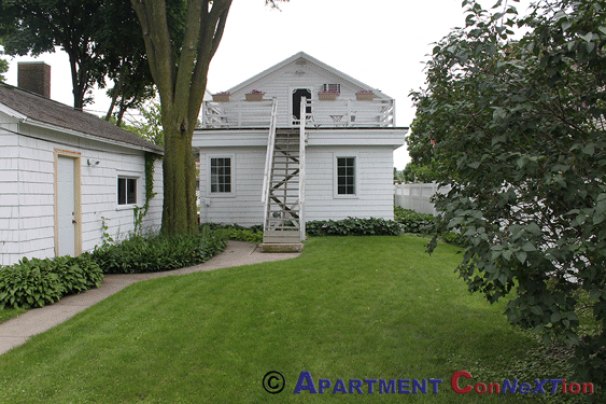 Yard View to Deck and Entry