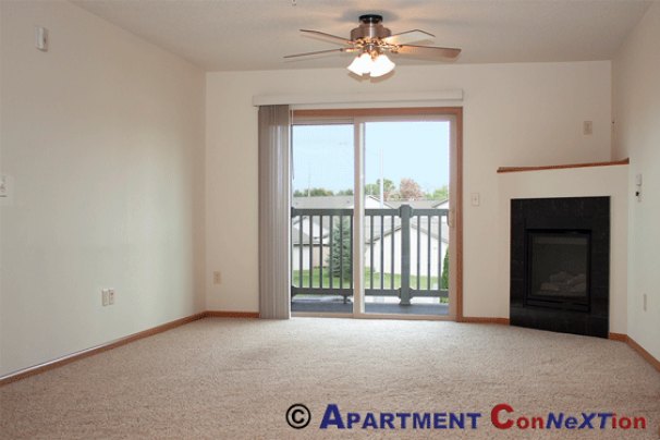 Living Room with Fireplace & Deck/Patio Access